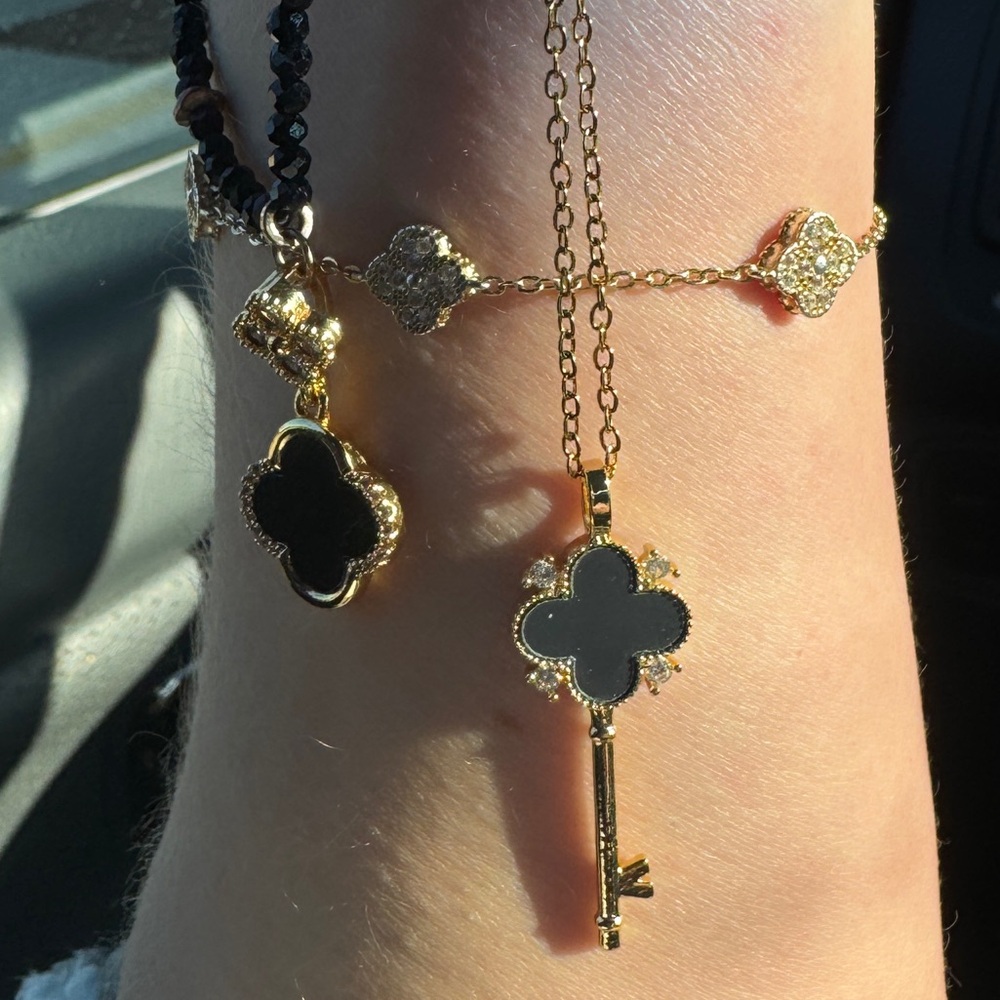 Elegant Gold and Black Pendant Necklace CLOVER .